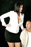 Carmella Bing with a bound up Keiran Lee